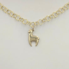 Load image into Gallery viewer, Alpaca Huacaya hand-made 14K yellow gold crescent shaped charm with a gender accent stamp; shiny finish
