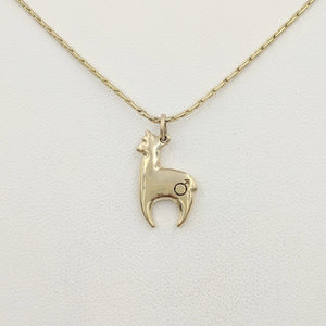 Alpaca Huacaya hand-made 14K yellow gold crescent shaped pendant with a gender accent stamp; shiny finish