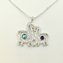 Load image into Gallery viewer, Alpaca or Llama Duo Compact Spiral Pendant with Cabochon Gemstones - Sterling Silver with Amethyst and blue Topaz