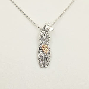 Llama Swoosh Tush Pendant - View from behind  Sterling Silver Llama with a 14K Rose Gold tail that actually moves