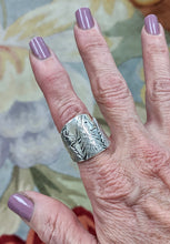 Load image into Gallery viewer, Llama Silhouette Cigar Band Style Ring with 3 Heads - 23mm - showing tapered design on woman&#39;s hand.  Sterling Silver