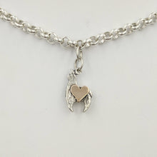 Load image into Gallery viewer, Sterling silver crescent charm with 14K rose gold heart accent.