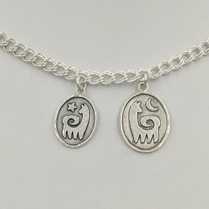 2 sizes of Alpaca or Llama Reflection Petrogylph Charms - with Star and Moon Hammered Rim  Sterling Silver