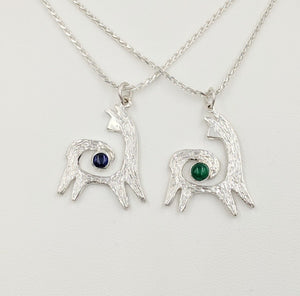 Two Alpaca or Llama Reflection Spiral Pendants - One with an Iolite Cabochon Gemstone and One with an imitation Emerald Cabochon Gemstone - Sterling Silver