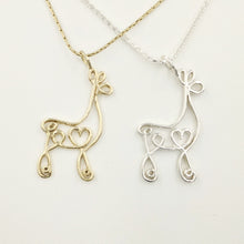 Load image into Gallery viewer, Alpaca or Llama Romantic Ribbon Pendant - Looks like a continuous line drawing made onto the shape of an alpaca or llama   Smooth finish 14K Yellow Gold and Sterling Silver