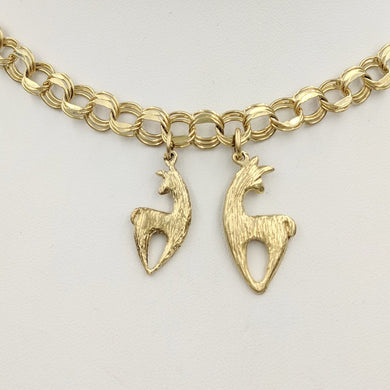 2 sizes of the Alpaca or Llama Spirit Crescent Charms with a fiber finish. - 14K Yellow Gold