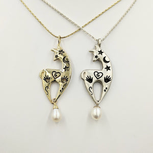  Two Alpaca or Llama Spirit Image Pendants- with a White Freshwater Pearl Dangles one with a Satin finish Sterling Silver and one 14K Yellow Gold with a shiny finish
