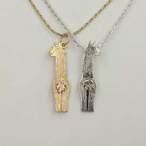 Sterling Silver Alpaca Suri Pendants viewed from the back  14K Yellow Gold Suri with a 14K Rose Gold and an all Sterling Silver Suri  both tails actually move