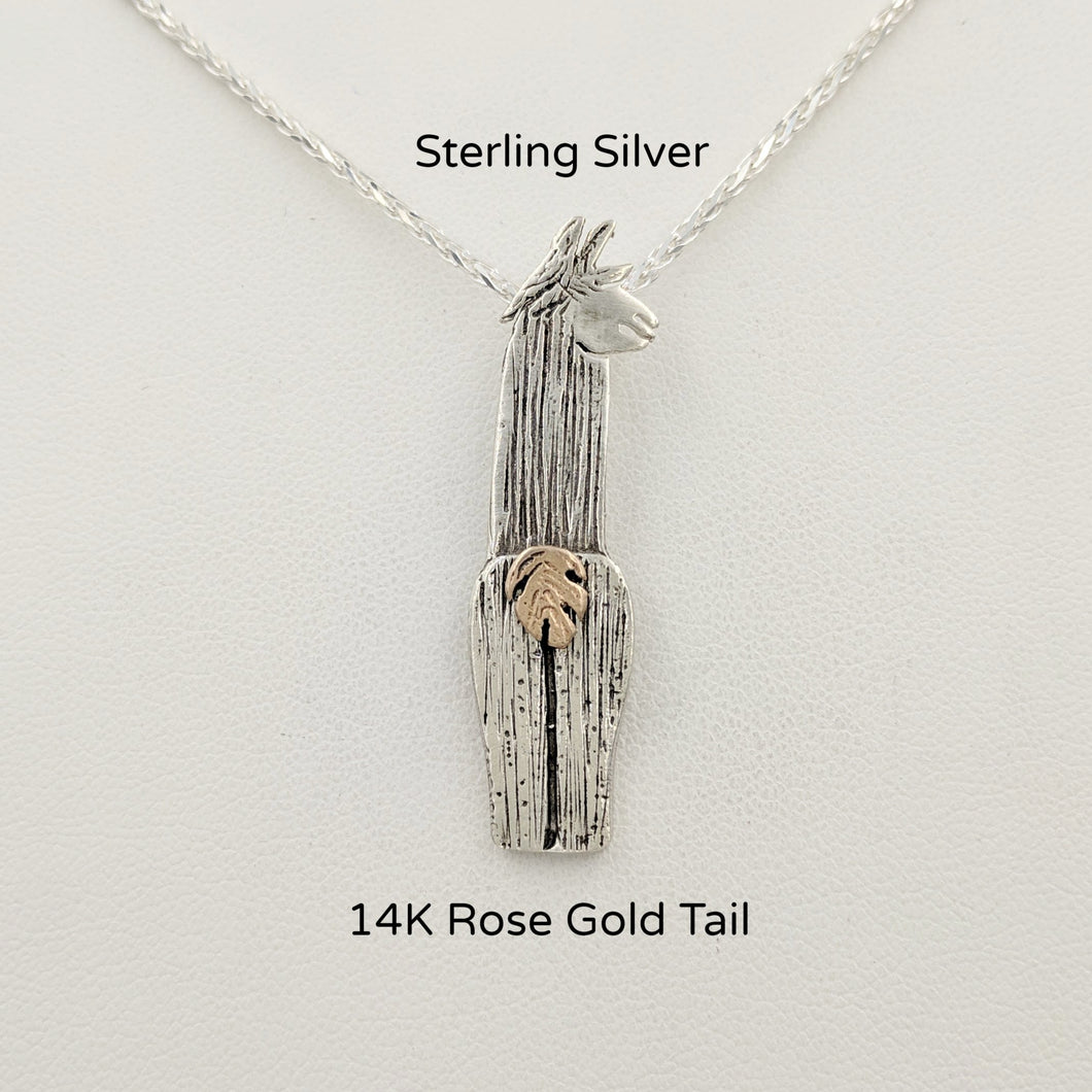 Sterling Silver Alpaca Suri Pendant viewed from the back Sterling Silver Suri with a 14K Rose Gold tail, that actually moves