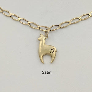 Alpaca Huacaya hand-made 14K yellow gold crescent shaped charm with a gender accent stamp; satin finish