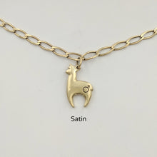 Load image into Gallery viewer, Alpaca Huacaya hand-made 14K yellow gold crescent shaped charm with a gender accent stamp; satin finish