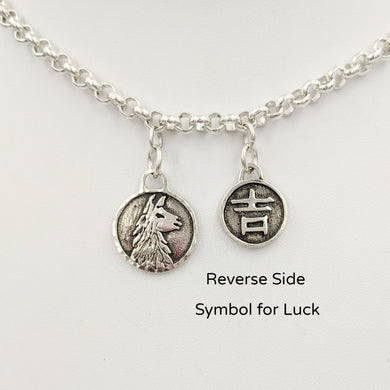 Llama Luck Reversible Charms showing both sides -the Llama head and the Good Luck symbol Sterling Silver