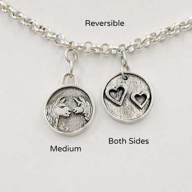 Llama  Momma Baby Cria Kiss Charm - Reversible Charm; medium size.  Mother and baby on one side; 2 hearts on the reverse.  Sterling Silver