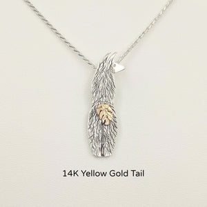 Viewed from behind  Silver Swoosh Tush Llama Pendant - with a 14K Yellow Gold tail