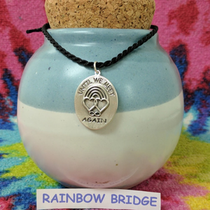 Rainbow Bridge Ovals Discs  Front Side Sterling Silver Shown on memorial urn