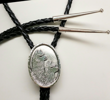 Load image into Gallery viewer, Custom Bolo Tie - Sterling Silver with 2 Huacaya Alpaca Heads in Profile - Sterling Silver Tips on the Leather Bolo Cord